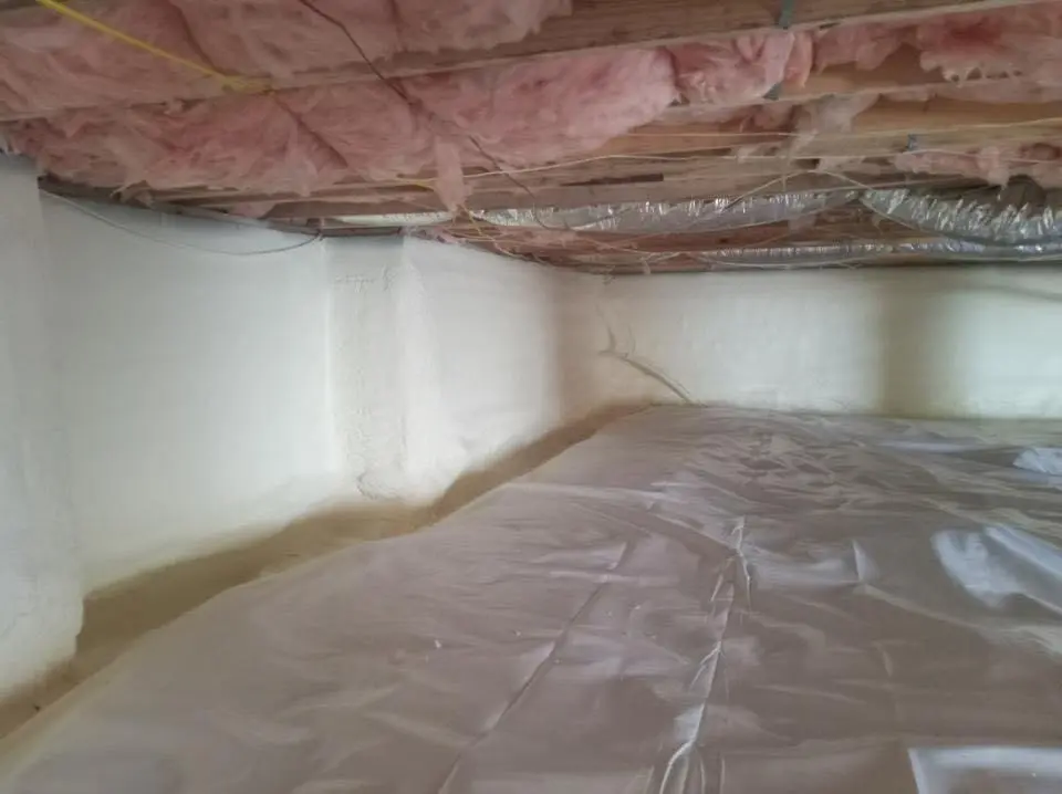 Crawl space encapsulation with closed-cell spray foam for Commercial Roof Restoration in Crowley